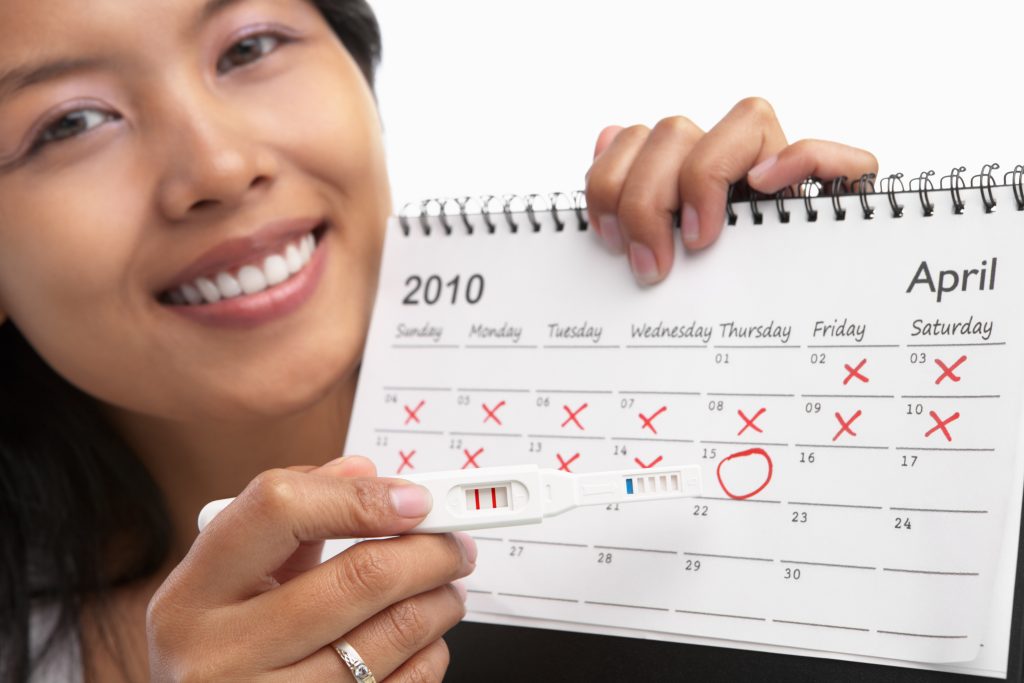 WOMAN WITH CALENDAR