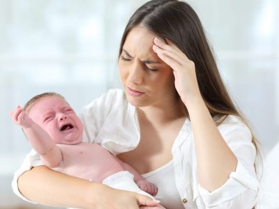 Desperate mother and her baby crying