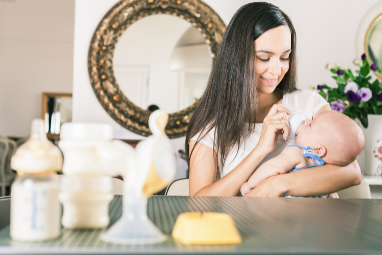 mom pumping and bottle feeding