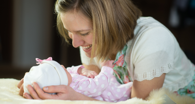 happy mom with baby