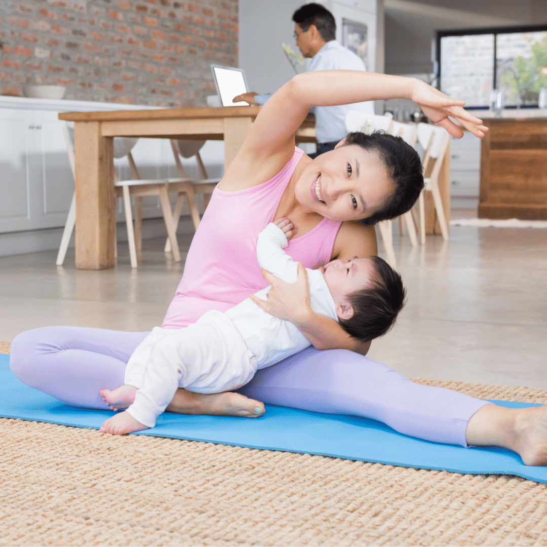 mom doing yoga with baby